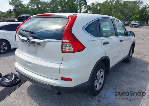 2015 Honda Cr-V Lx z USA, uszkodzony, nr VIN 5J6RM3H3XFL007115